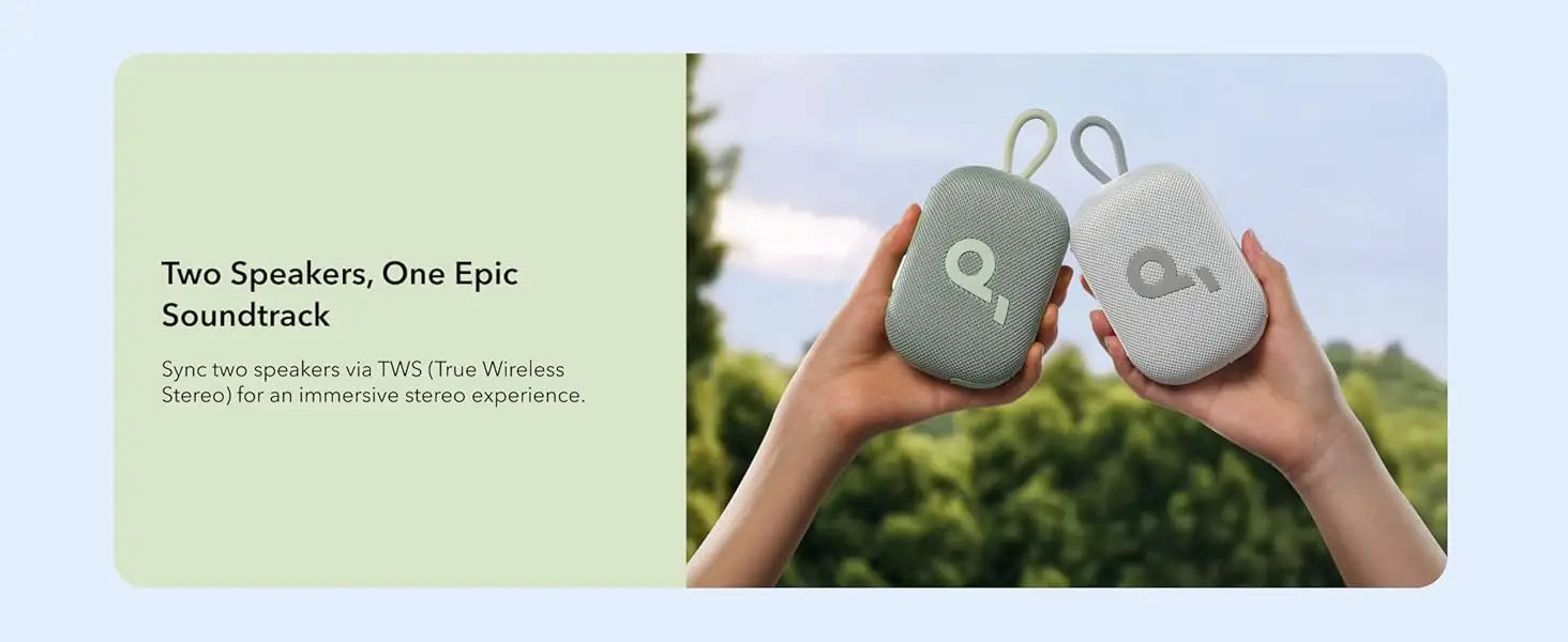 Compact portable speaker being held outdoors – easy to carry