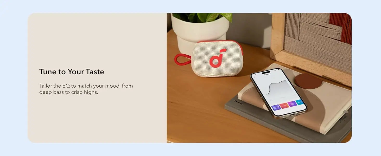 Bluetooth speaker placed on a desk with coffee cup – compact size